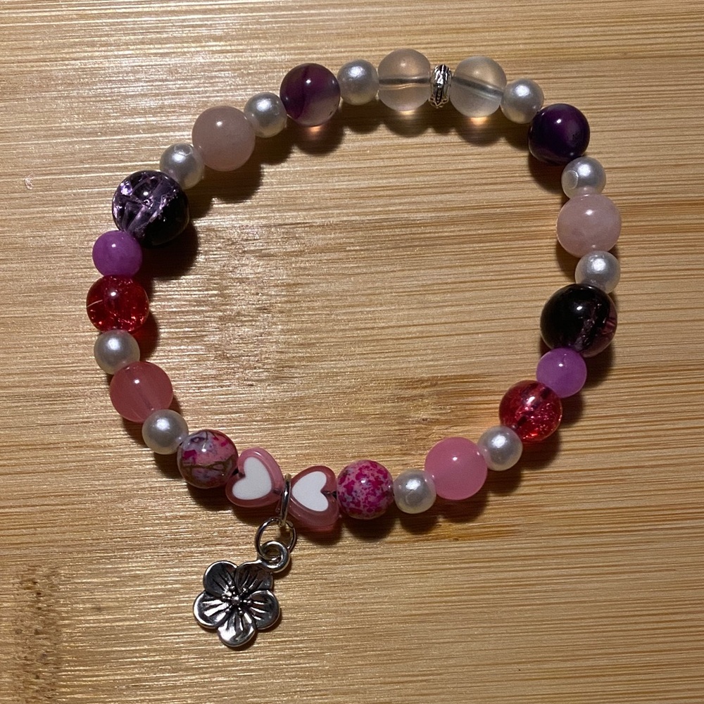 Charming Pink and Purple Beaded Bracelet with Silver Flower Charm